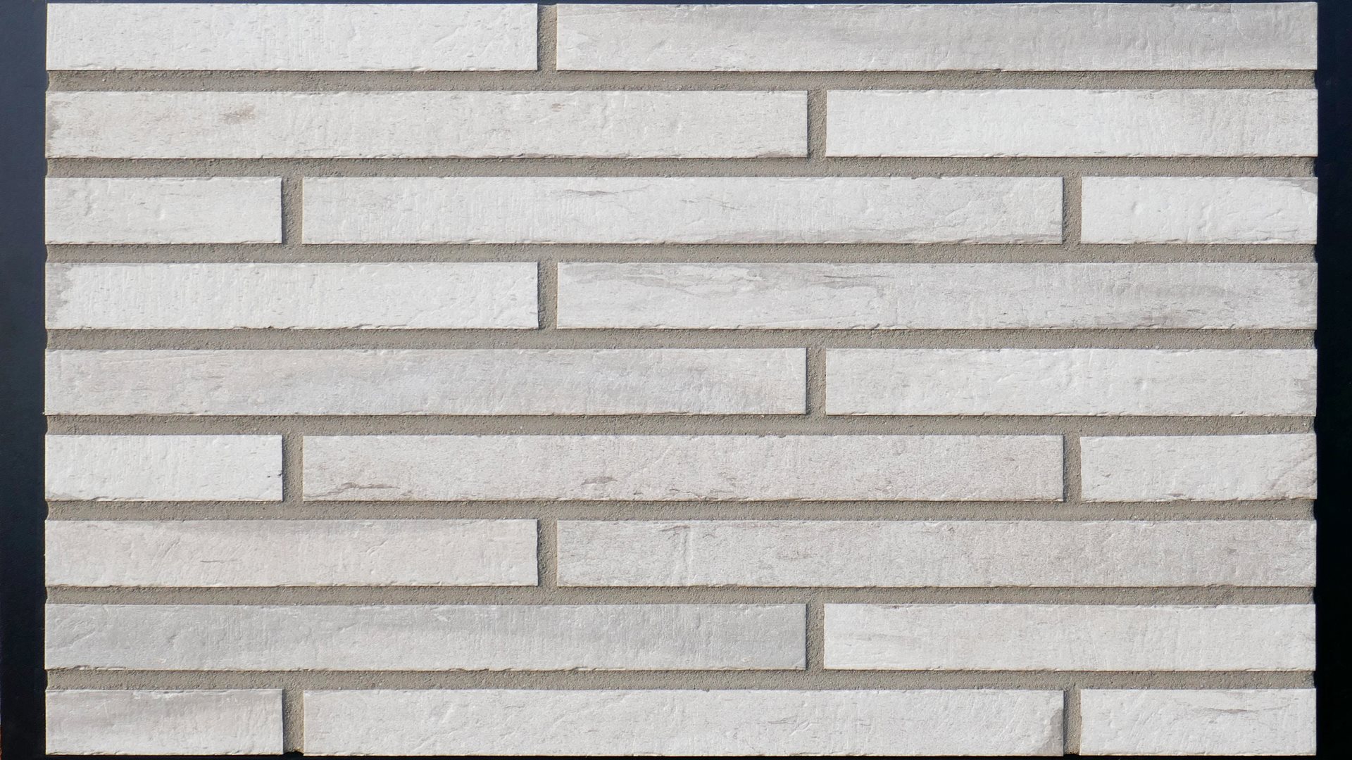 Brickloft hellgrau hosszú keskeny szürkésfehér homlokzatburkoló